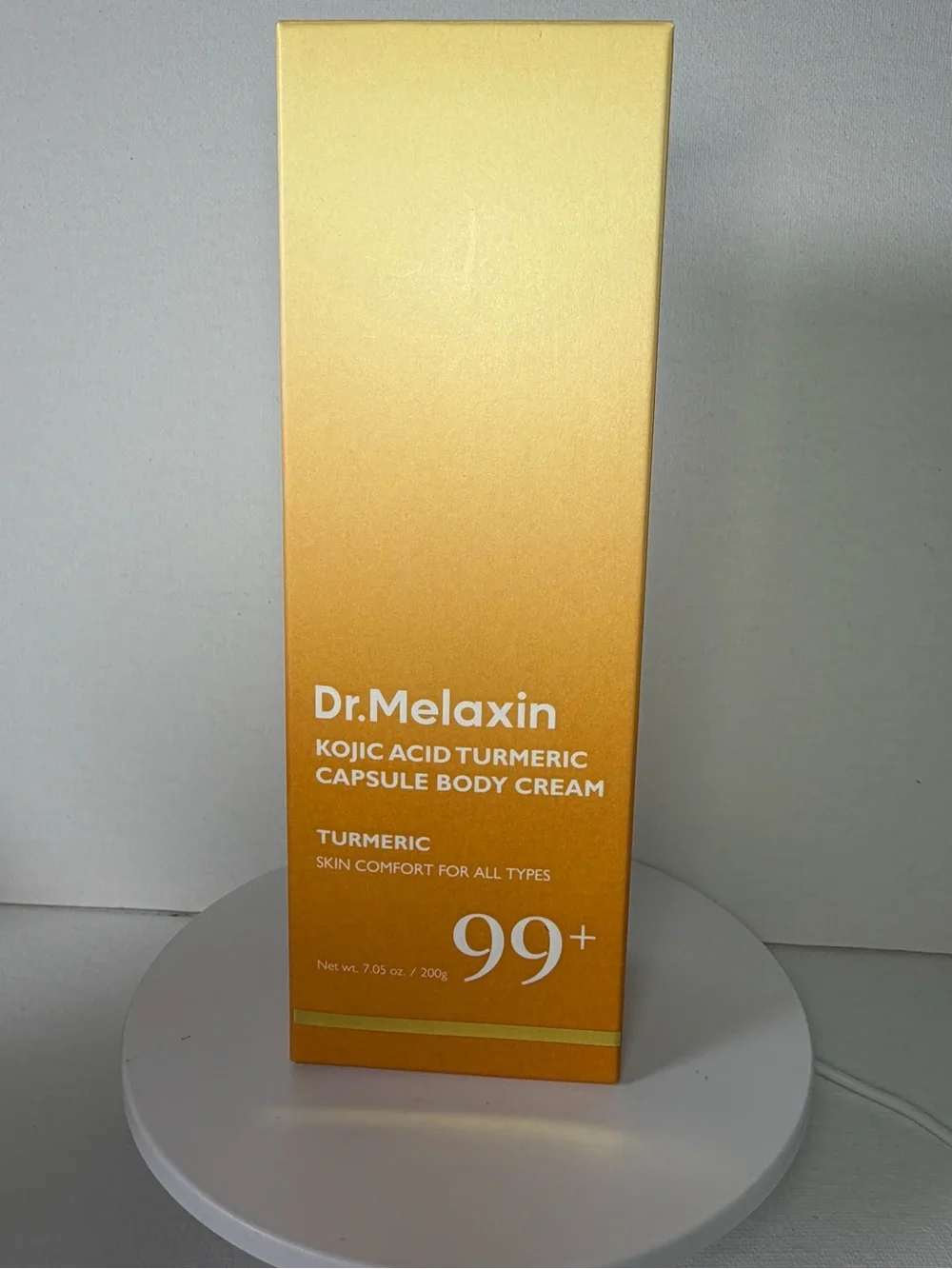 Turmeric Kojic Acid Capsule Body Cream — Golden Yellow
